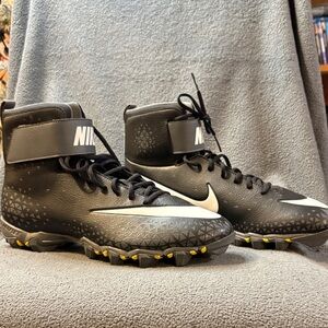 Nike Black and White High-Top Cleats